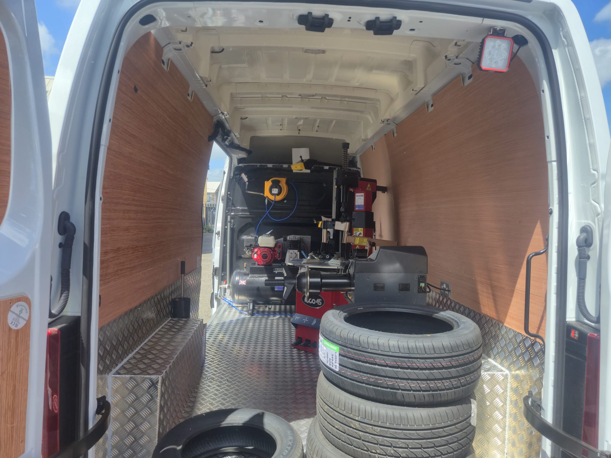 Inside MJN Tyres mobile unit - tyre changer, balancer and compressor on board